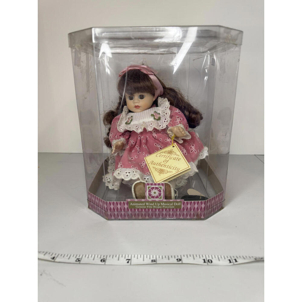 Animated Wind-Up Musical Doll in Pink Dress with Certificate of Authenticity